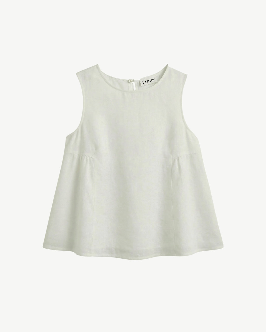 Biarritz top in white linen, flat lay showing clean neckline and flared shape