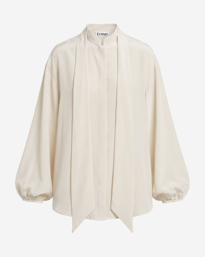 Caen blouse in cloud dancer silk blend, flat lay showing voluminous sleeves and gathering