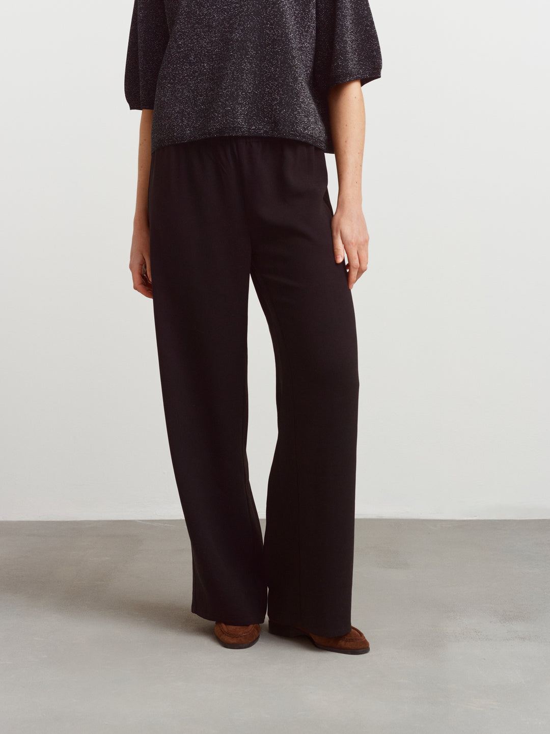 Como pull-on pant in black acetate, wide-leg silhouette worn with a knitted top