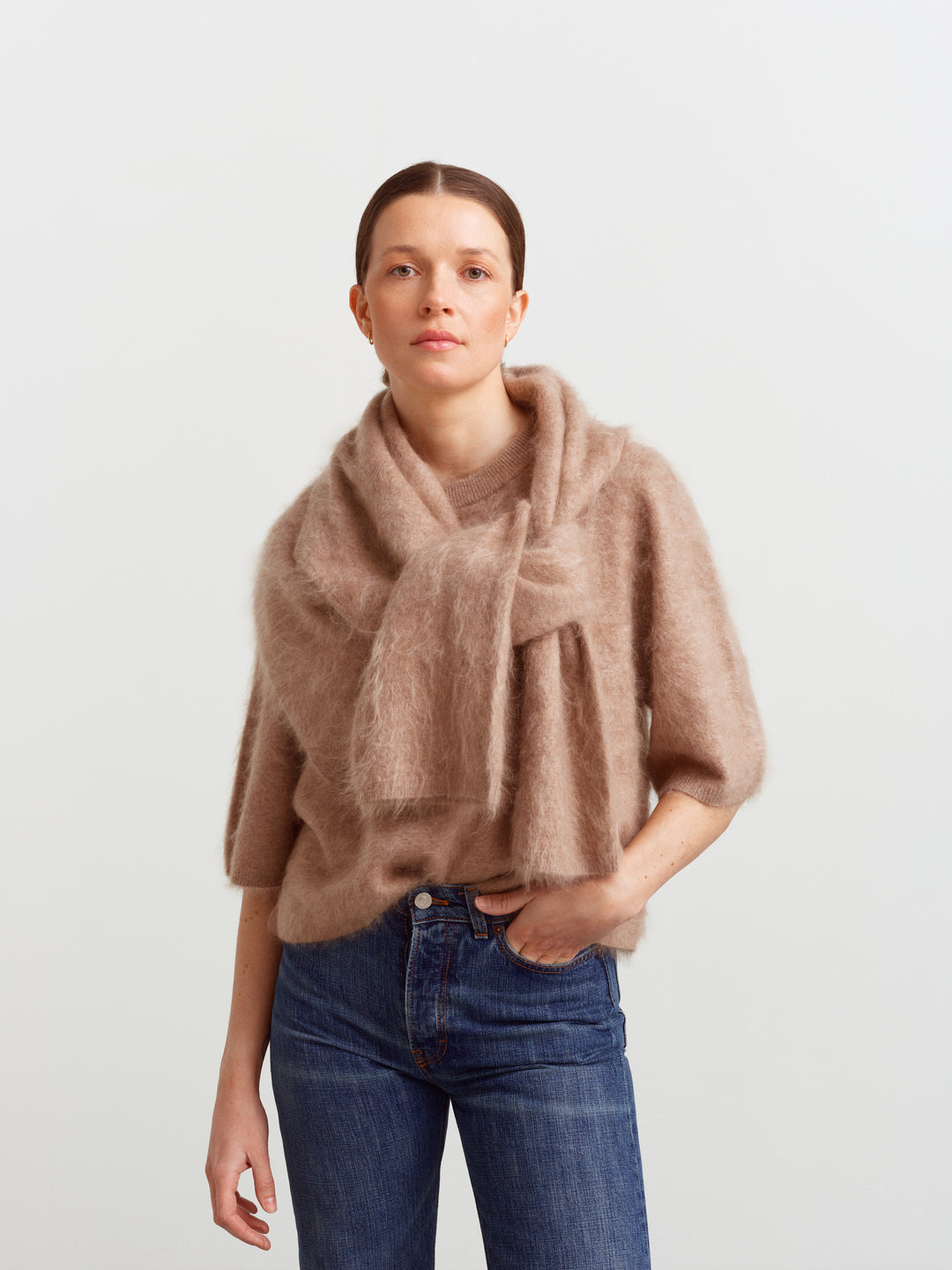 Modena tee in mushroom brushed cashmere, worn with a matching scarf draped at the neck
