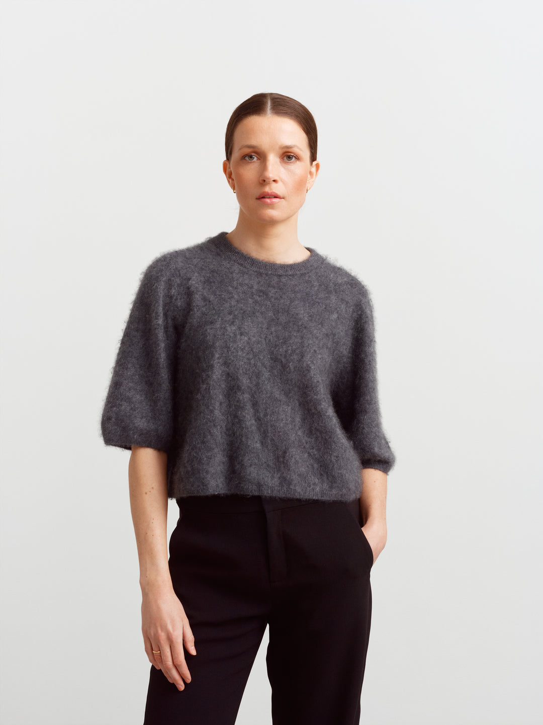 Modena tee in tundra grey brushed cashmere, front view with hands in trouser pockets