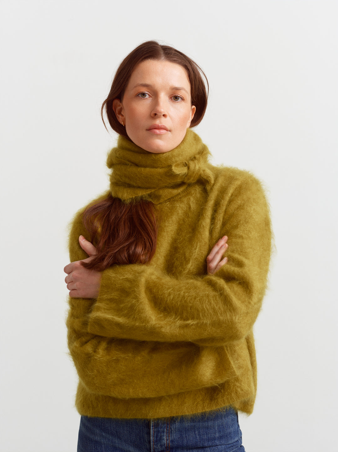 Montreal sweater in fresh moss brushed cashmere, close-up of the soft brushed texture and scarf