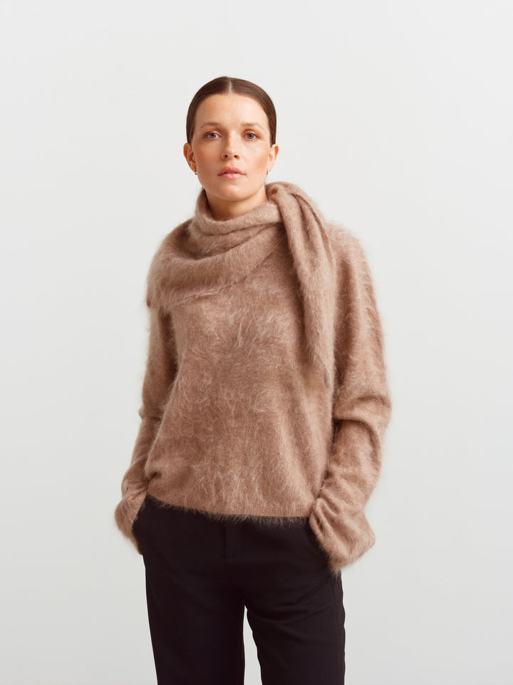 Montreal sweater in mushroom brushed cashmere, worn with a matching scarf draped at the neck