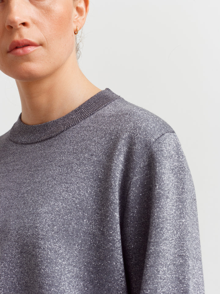 Montreal sweater in gun metal glow, close-up of metallic lurex threads and crew neckline