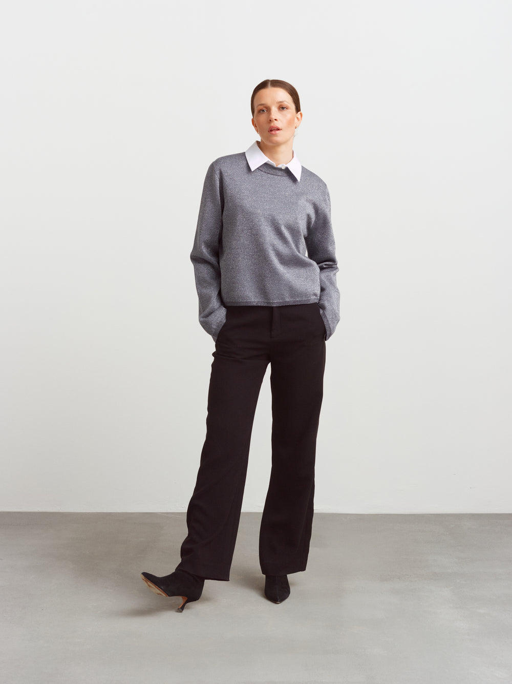Montreal sweater in gun metal glow metallic lurex knit, worn with black tailored trousers