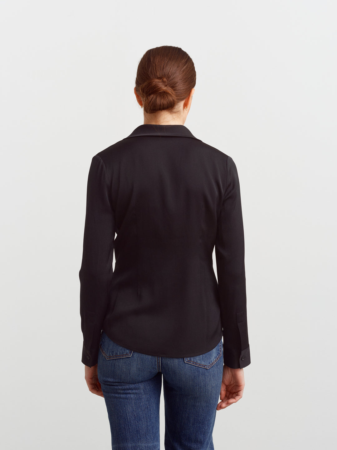 New York blouse in black silk blend, back view showing fluid drape and set-in sleeves