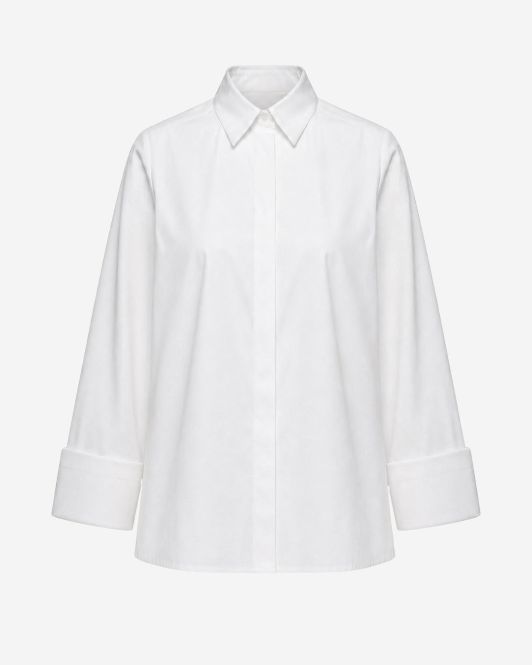 Odense shirt in white organic cotton, flat lay showing wide turn-up cuffs and pointed collar
