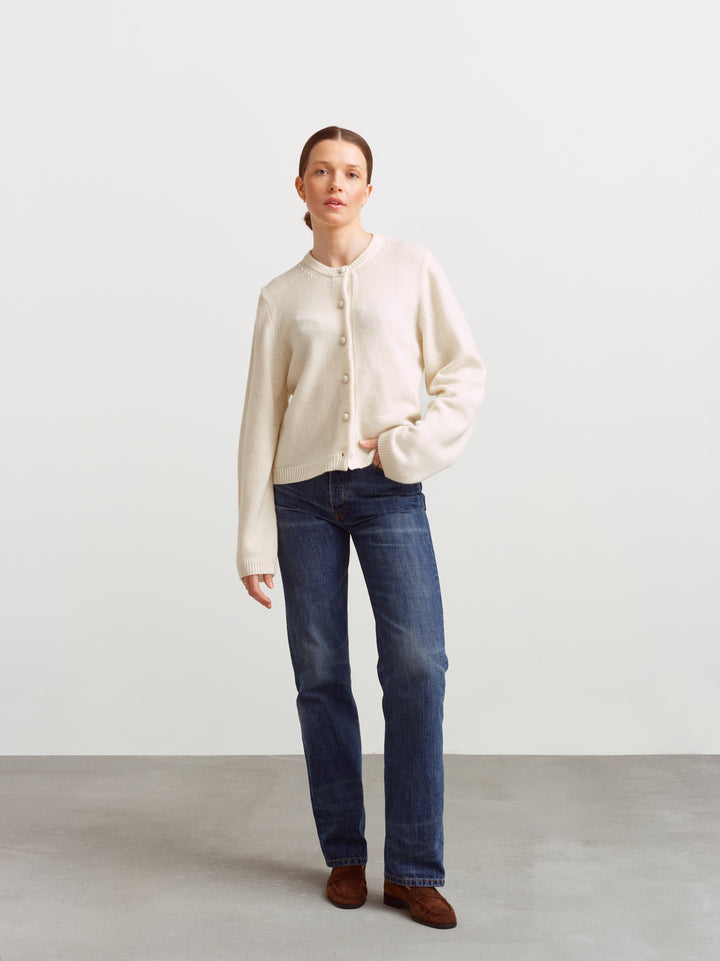 Verona wool cashmere cardigan in cloud dancer, buttoned front, worn with straight-leg jeans and brown loafers